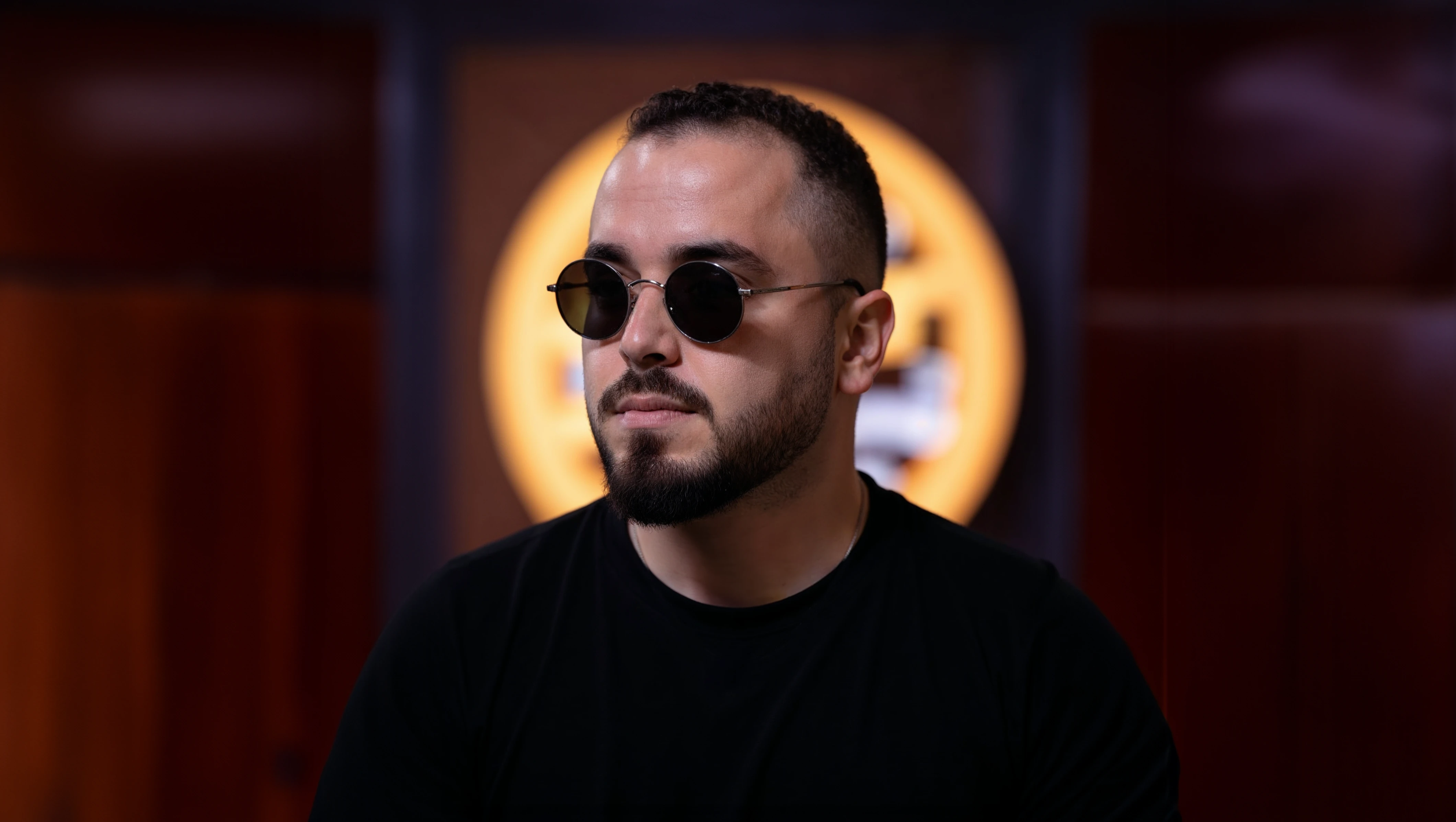 Nabil Khaled wearing sunglasses