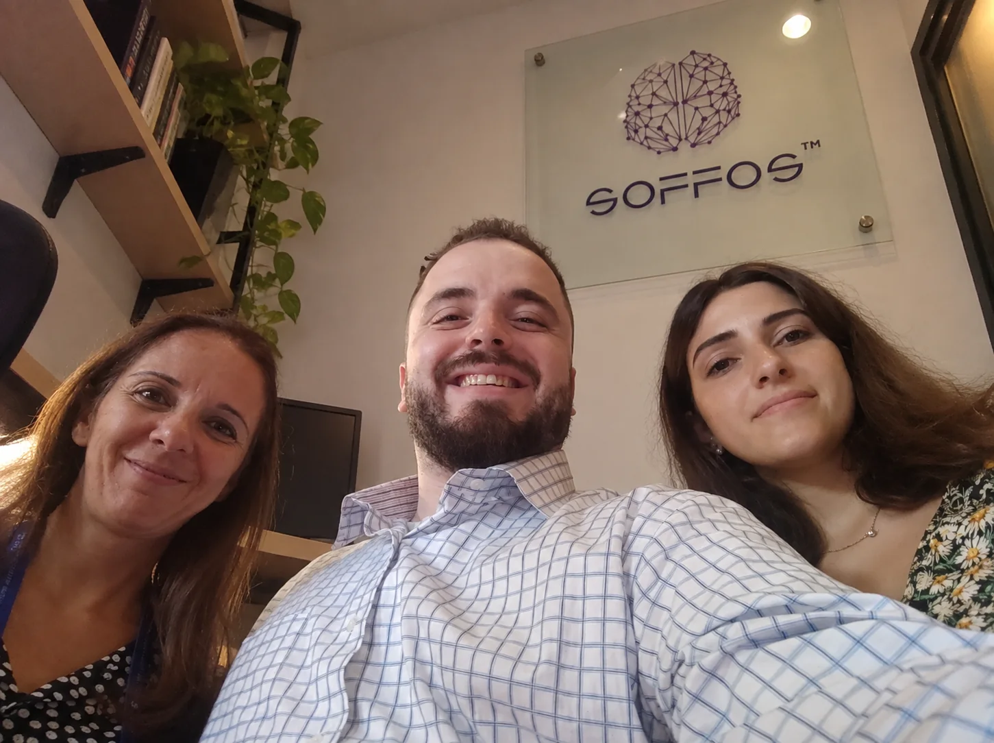 Nabil Khaled with two colleagues at the Soffos office